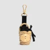 Iconic bucket charm in raffia