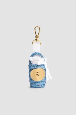 Iconic bucket charm in raffia