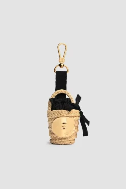 Iconic bucket charm in raffia