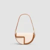 Le Patou bag in leather and canvas