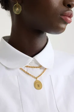 Small face brass earrings